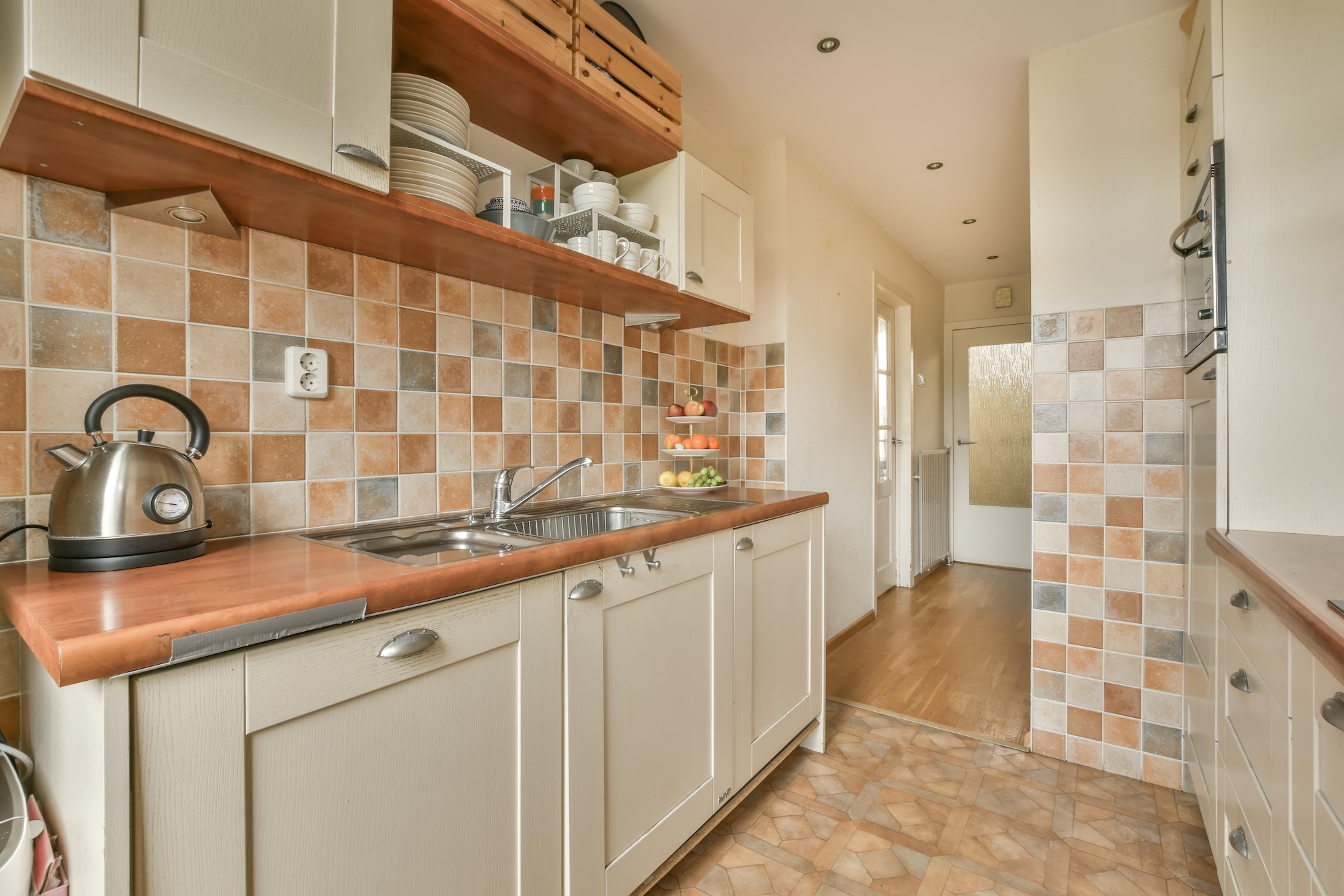 Kitchen with multicolored tiles